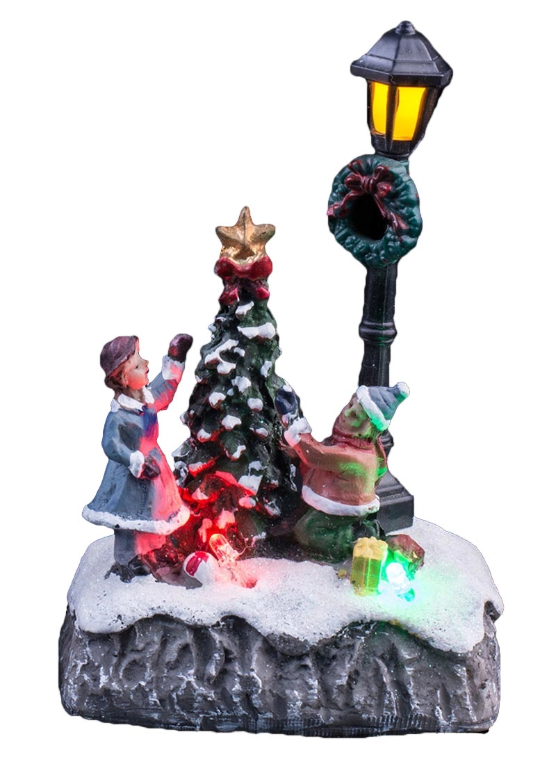 Rozświetlona scena świąteczna z dziećmi Udekoruj choinkę