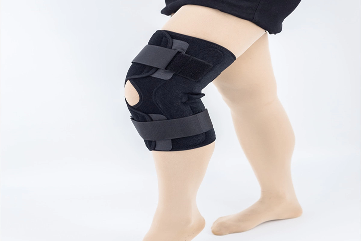 Otwarta rzepka ortezy kolana z aluminiowymi zawiasami Dual Pivot